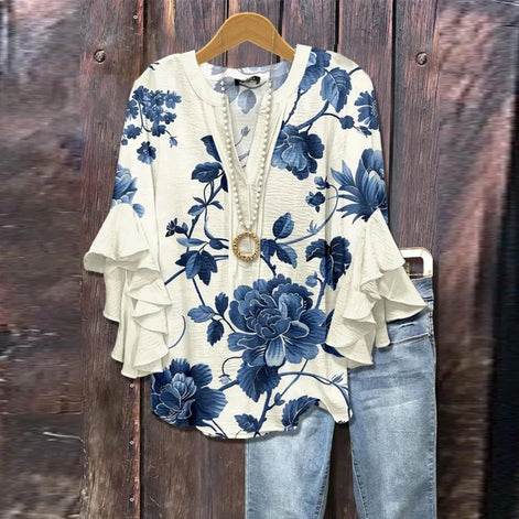 Vintageblus met bloemenpatroon