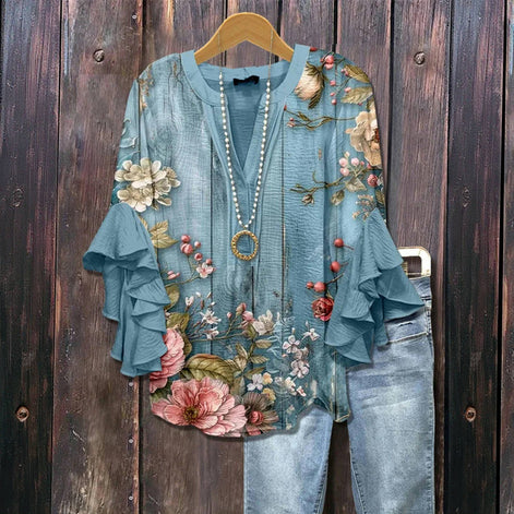 Vintageblus met bloemenpatroon