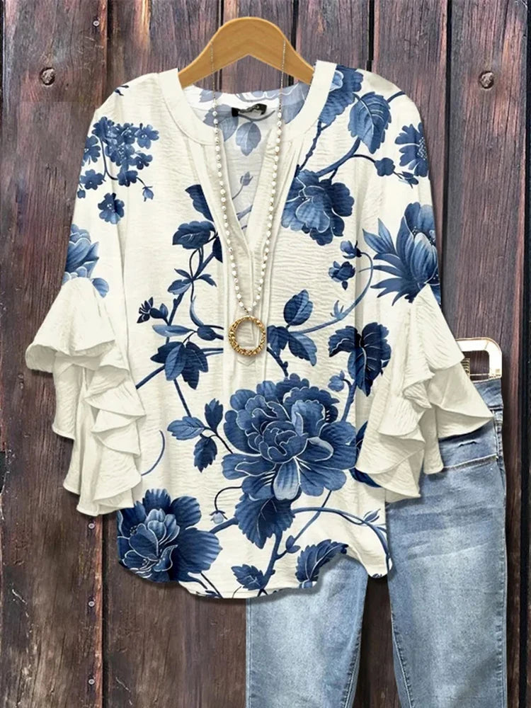 Vintageblus met bloemenpatroon