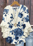 Vintageblus met bloemenpatroon 