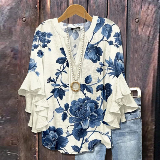 Vintageblus met bloemenpatroon